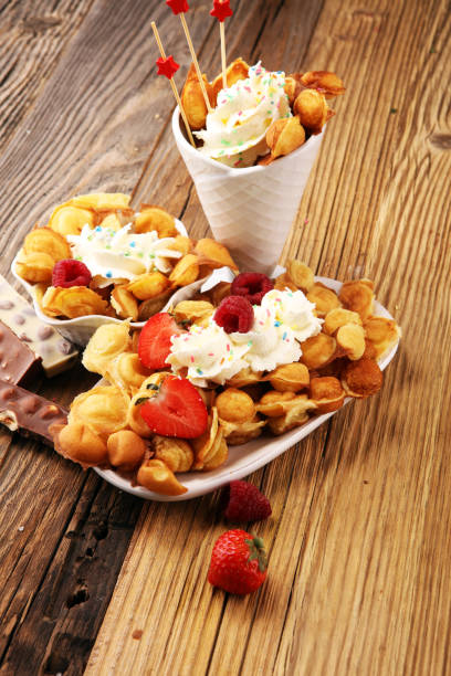 istock Hong Kong style egg waffle on wooden board. bubble waffle 1090231730