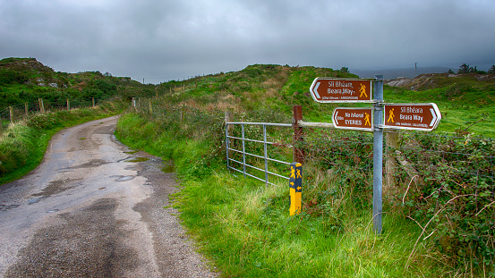 Roadsigns for hiking directions near eyeries at the Beara Peninsula, Ireland.