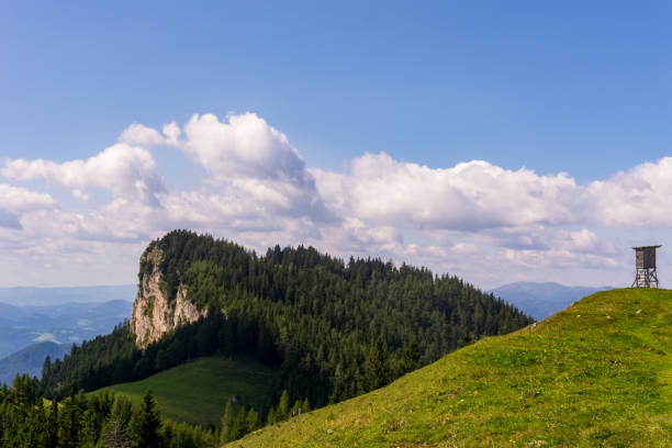 istock Rock face and small high seat surrounded by trees with a fantastic view 1090235424