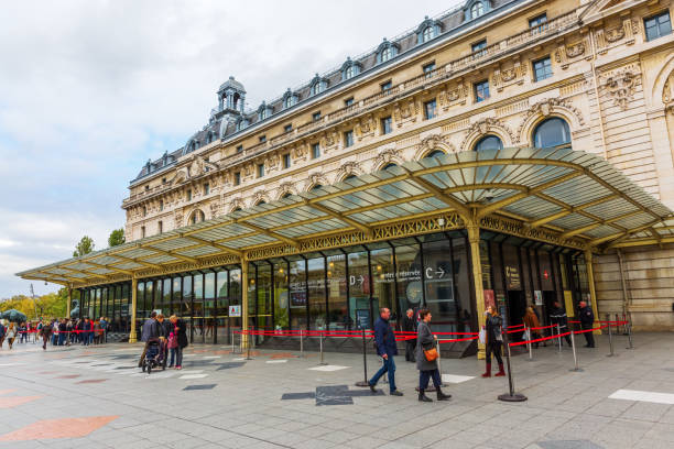 Musee d'Orsay in Paris, France Paris, France - October 19, 2016: Musee d'Orsay with unidentified people. It houses in the former Gare d'Orsay, a Beaux-Arts railway station. It is one of the largest museums in Europe musee dorsay stock pictures, royalty-free photos & images