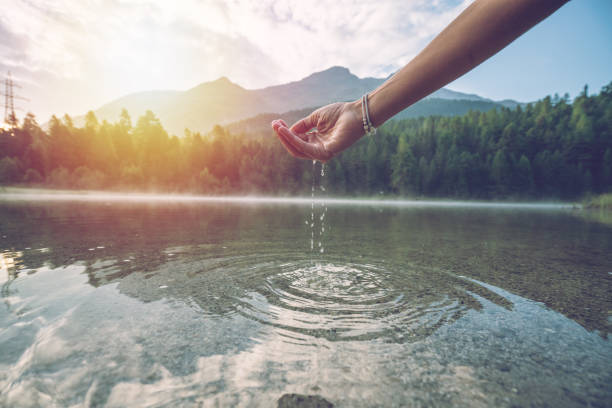 Human hand cupped to catch fresh water from mountain lake, Switzerland Human hand cupped to catch the fresh water from the lake, reflection on water surface
Shot in Switzerland graubunden canton stock pictures, royalty-free photos & images