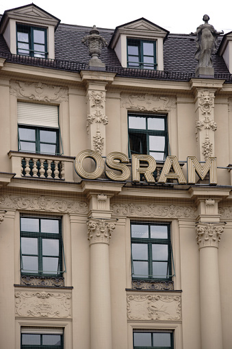 Munich, Germany - June 29, 2018: The logo of the company Osram a producer of bulbs at a historic building in the old town on June 29, 2018 in Munich.