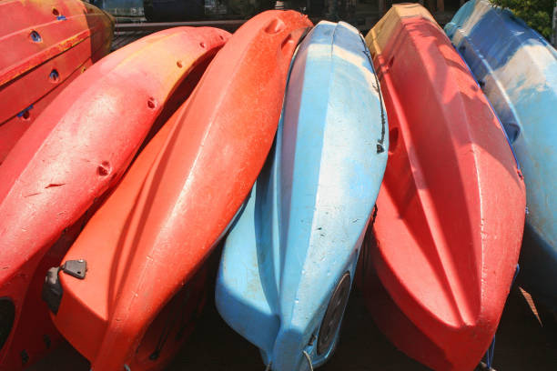 kayaks or canoes piled on the floor