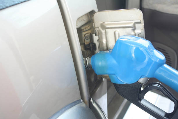 istock Adding fuel oil in car tank 1090264940