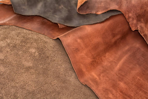 istock Texture of pieces brown leather. Natural material background. 1090269024