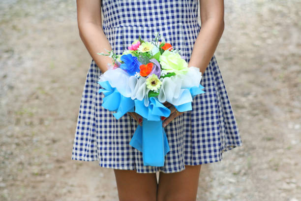 istock Girl holding beautiful bouquet 1090270428