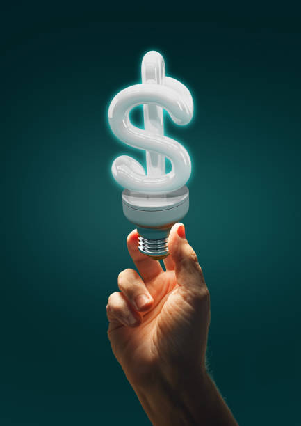 istock Spiral Light Bulb in shape of dollar sign 1090277654