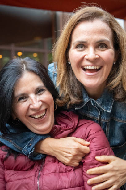istock smiling mature women posing looking at the camera 1090279996