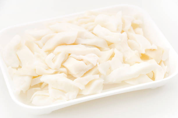 istock Boiled squid in foam tray on white background 1090289482
