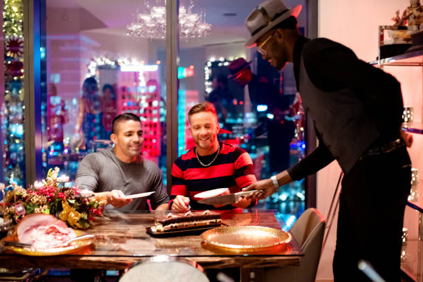istock Christmas meal with multi-ethnic gays 1090319966