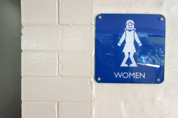 Urinary Urgency Toilet Sign for girls at the entrance to a public toilet