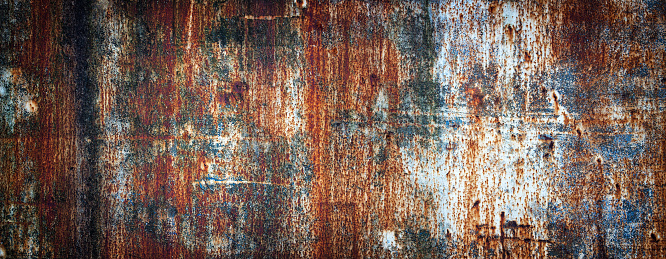 rusty metal texture painted in different colors, colored iron wall