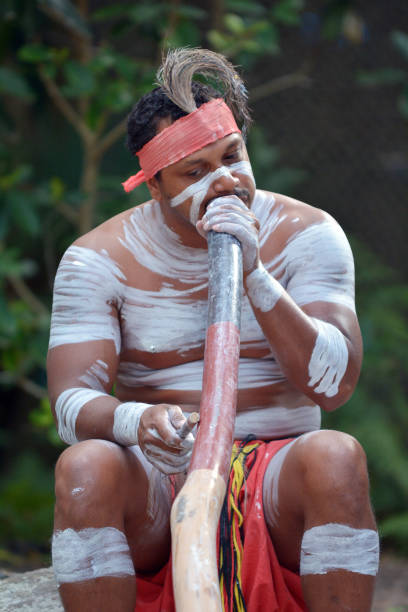 istock Indigenous Australian Man playing Aboriginal  Music on Didgeridoo Instrument 1090331336