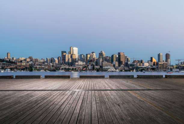 istock empty boardwalk front of urban skyline,seattle 1090340080