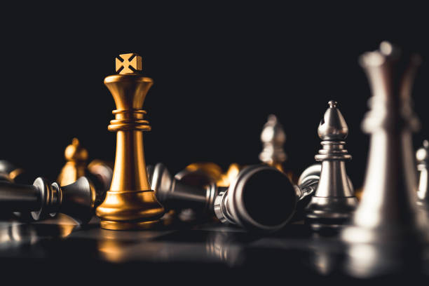 istock business strategy brainstorm chess board game with hand touch black background with free copy space for your text 1090343314