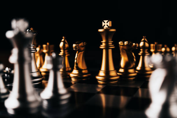 istock business strategy brainstorm chess board game with hand touch black background with free copy space for your text 1090343328