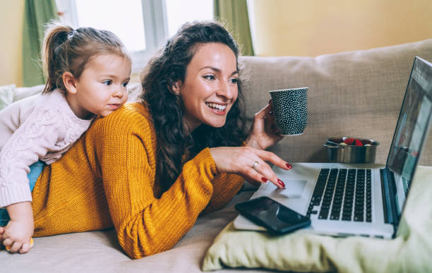 istock Mother and daughter Having fun online 1090343374