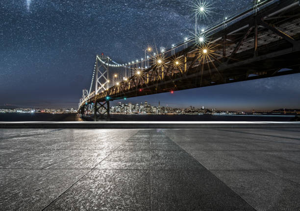istock speeding highway travel through bay bridge under milky way 1090344510