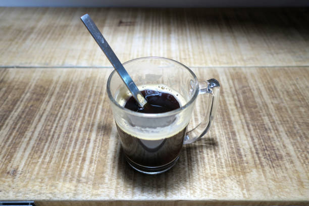 istock hot americano on wood texture top 1090348300