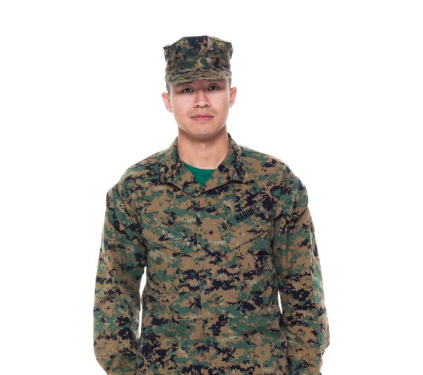 istock US Marine in uniform holding rifle 1090350520