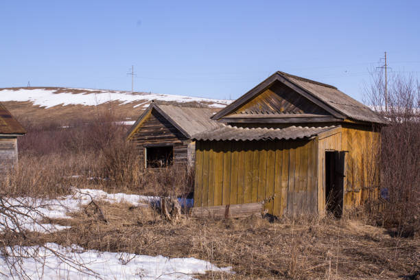 istock old abandoned wooden house in spring 1090351252