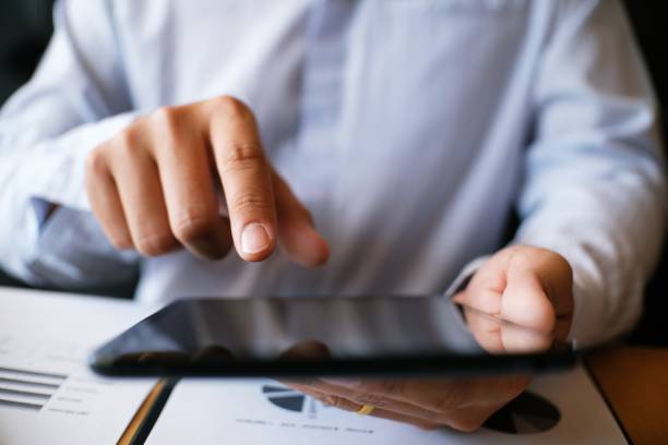 istock Business people making presentation with his colleagues and business tablet digital computer as meeting concept. 1090351558