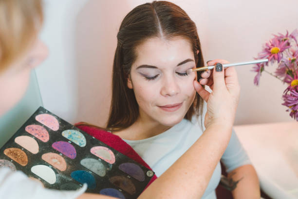 istock Make-up artist working on a wedding look for a client 1090367558