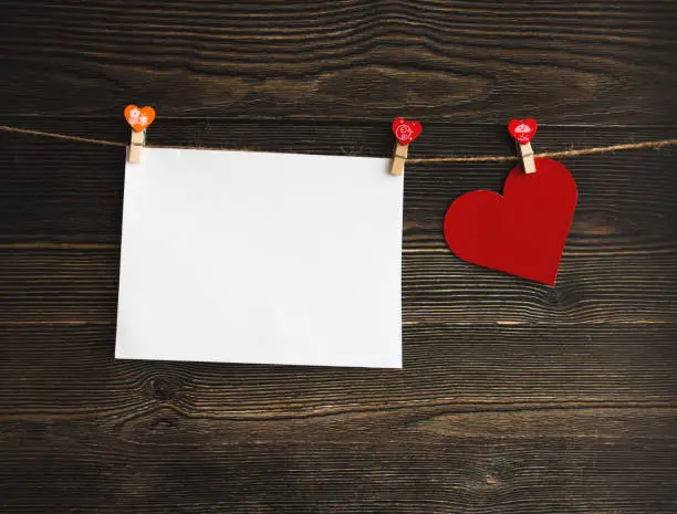 Valentines day card with heart and old wood background