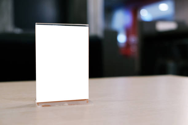 istock Menu frame standing on wood table in Bar restaurant cafe. space for text marketing promotion. 1090369606