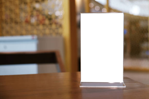 istock Menu frame standing on wood table in Bar restaurant cafe. space for text marketing promotion. 1090369616