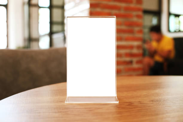istock Menu frame standing on wood table in Bar restaurant cafe. space for text marketing promotion. 1090369724