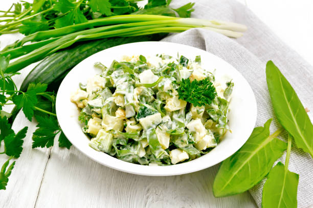 istock Salad with potatoes and sorrel on wooden table 1090372694