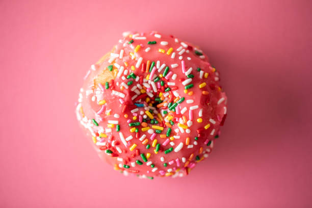 istock Pink Strawberry Donut With Sprinkles 1090378094