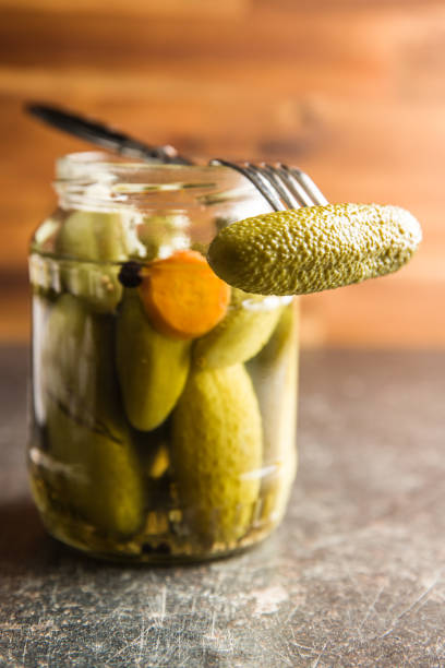 istock Preserved cucumbers. Tasty pickles. 1090379360