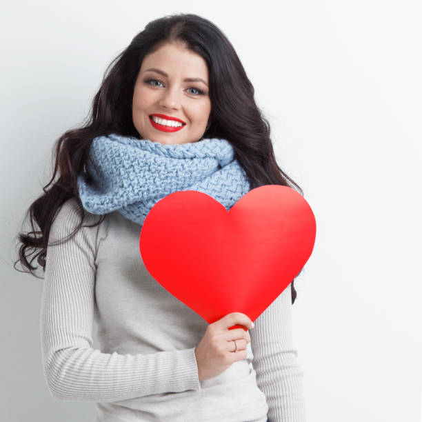istock Woman showing paper heart 1090380024