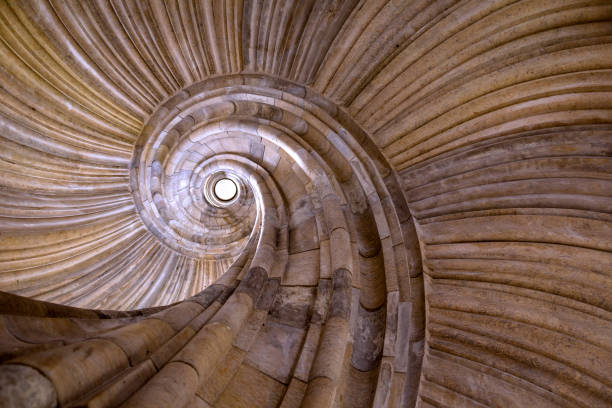 istock Interesting medieval spiral staircase, sandstone material. 1090383510