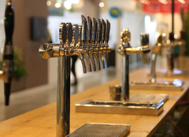 istock beer taps on the counter of an Irish pub 1090383696