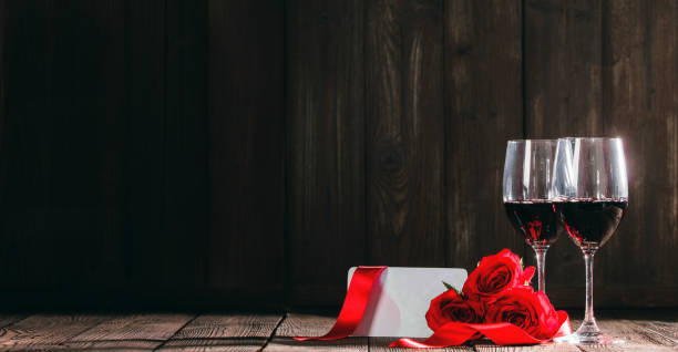istock Wine roses and card Valentine day 1090383894