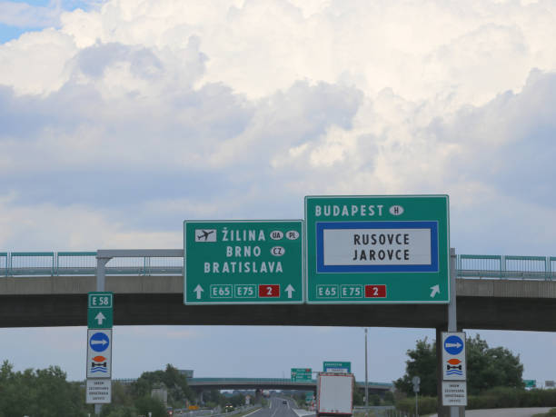 istock highway sign on the border between Hungary and Czech Repoublic w 1090384154