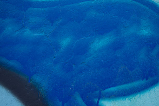 istock Abstract paint in hues of blue on concrete wall 1090388636