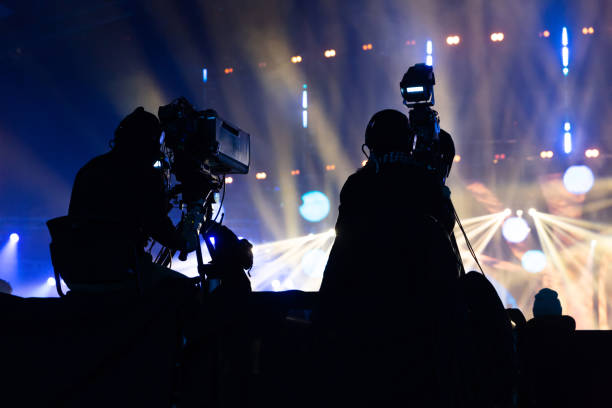 istock A group of cameramen working during the concert. 1090388842