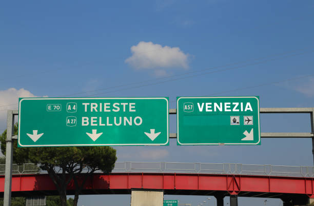 italian highway sign with directions to go to venice or in the c - travel outdoors tourist venice italy imagens e fotografias de stock
