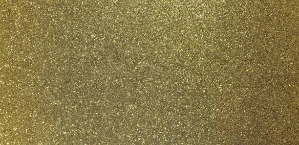 istock golden background with many glittery shimmering glitter ideal as 1090389954