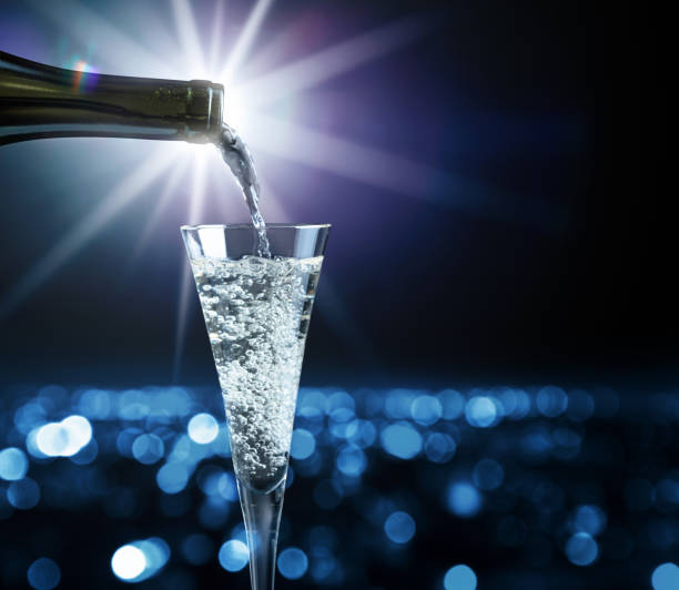 Champagne pouring into glass.
