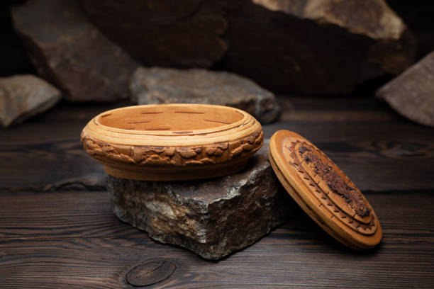 istock a small box of birch bark on a dark stone background 1090394114