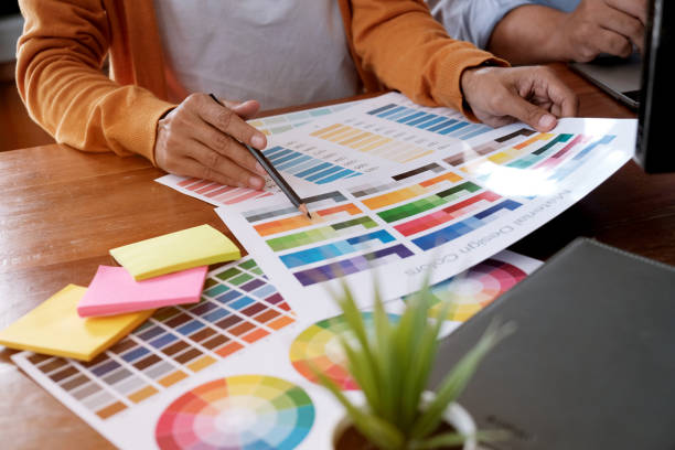 istock Graphic designer working on digital tablet. artist drawing on graphic tablet and Color swatch samples. 1090400954
