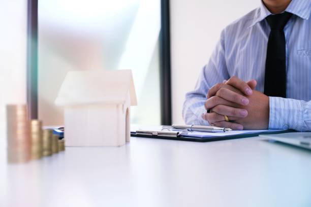 istock Sales manager giving advice application form document, considering mortgage loan offer for car and house insurance. 1090403482