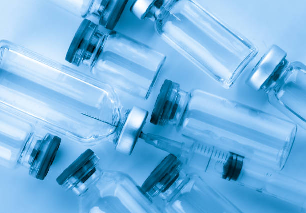 istock vaccines in the blue background 1090406406