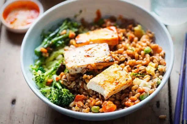 Spelt, broccoli, savoy cabbage with chargrilled tofu with sriracha