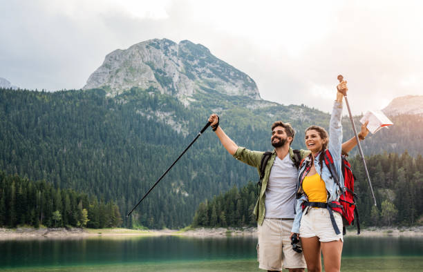 Happy young couple love hiking together. Happy young couple love hiking together. durmitor national park photos stock pictures, royalty-free photos & images